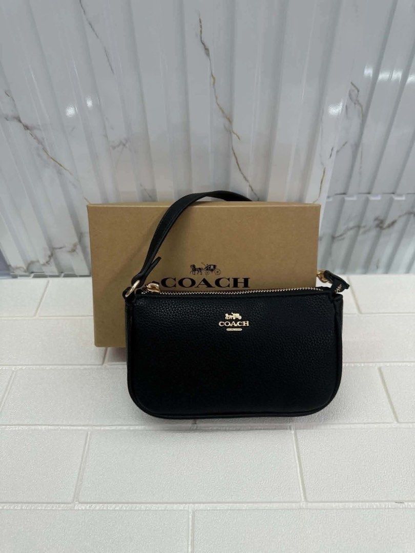 Coach Shoulder Bag (Category: Shoulder Bags) located in Quezon City. Submitted by stuffs.hellyy (Listing ID 1469794408, Image 3). Description: super nice! 🥹❤️ made in vietnam with box.