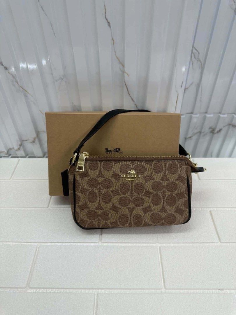 Coach Shoulder Bag (Category: Shoulder Bags) located in Quezon City. Submitted by stuffs.hellyy (Listing ID 1469794408, Image 2). Description: super nice! 🥹❤️ made in vietnam with box.