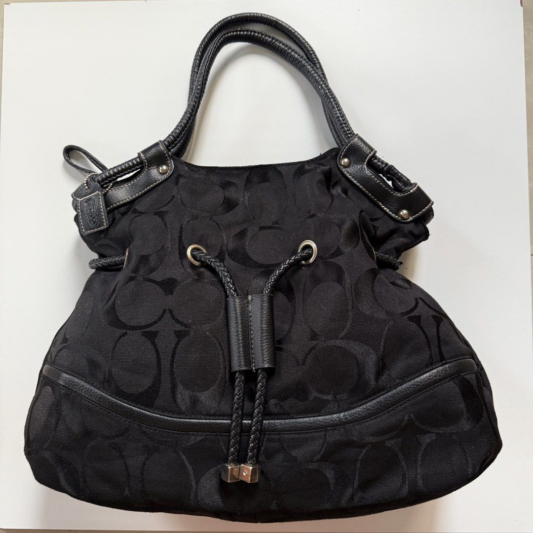 Coach signature black shoulder y2k (Category: Shoulder Bags) located in Cavite. Submitted by kalebfindsluxs (Listing ID 1469895392, Image 1). Description: Coach signature black shoulder y2k Good Sign of usage Check details - 2k + sf Loc cavite Jnt / lalamove .