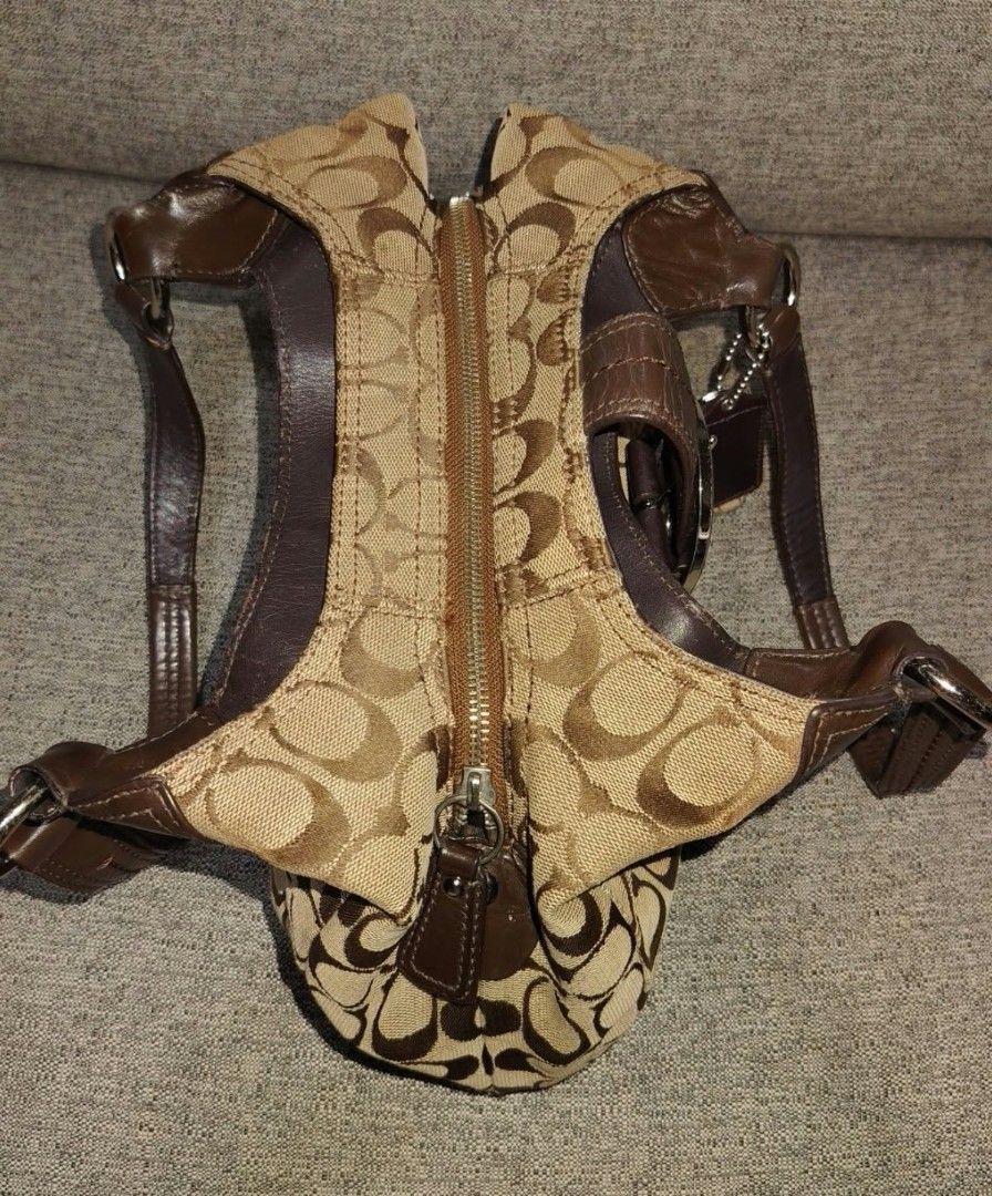 Coach Soho Lynn shoulder bag (Category: Luxury Bags & Wallets) located in Caloocan City. Submitted by tweetyferrer (Listing ID 1469793243, Image 3). Description: - Authentic Coach shoulder bag - Signature C jacquard fabric with premium brown leather trim - Dual shoulder straps for comfortable wear - Zipper top opening with magnetic buckle front closure - Includes original leather hangtag and heart charm - Clean interior featuring the Coach creed 