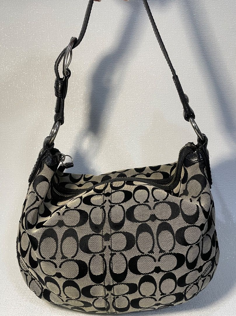 Coach Soho Signature Jacquard Medium Hobo (Category: Luxury Bags & Wallets) located in Manila. Submitted by tshoponline (Listing ID 1469845341, Image 1). Description: Coach Soho Signature Jacquard Medium Hobo •2008 - Style no. F13115 •Approx 11.5" L x 7.5" H x 2.0" W •Adjustable Shoulder Strap •Rank SA Excellent condition Location: Baguio 📍 Mop via Gcash / Gotyme / Bank Transfer Shipping via J&T/ LBC .