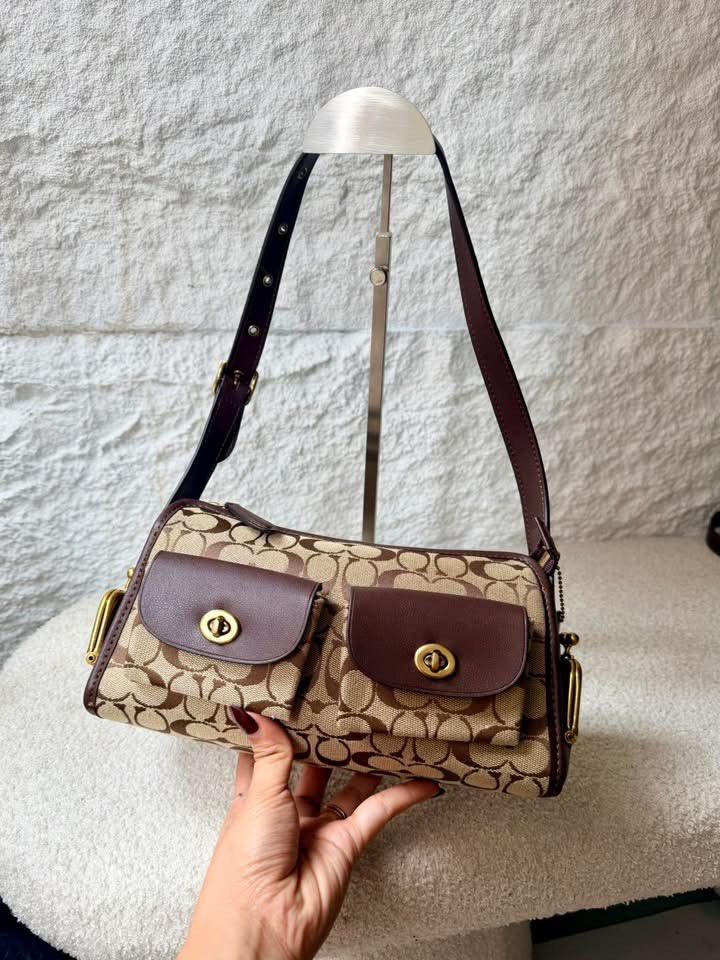 Coach Turnlock Haversack (Category: Shoulder Bags) located in Binan City. Submitted by pinkykeenshop (Listing ID 1469769346, Image 2). Description: .
