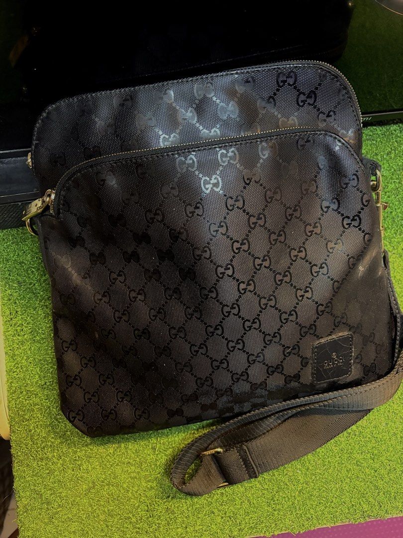 Coded GUCC! Sling bag (Category: Cross-body Bags) located in Davao. Submitted by ememlou17 (Listing ID 1469887131, Image 1). Description: Coded GUCC! Sling bag semi large size. Malinis ready to use. Makapal mabigat..