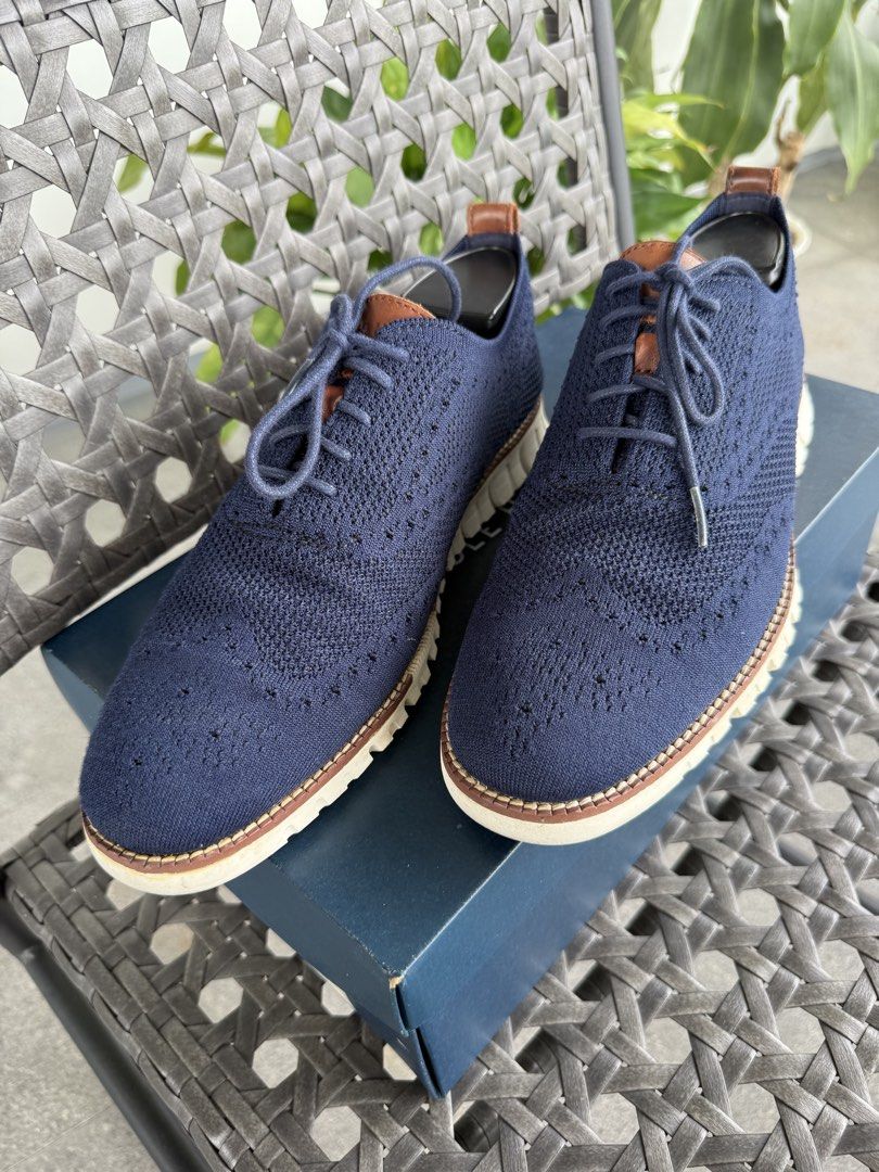 Cole Haan Zerogrand Stichlite (Category: Casual Shoes) located in Quezon City. Submitted by kevinstv3191 (Listing ID 1469781254, Image 3). Description: *NO TRADE/SWAP and LOW BALL OFFER* - Brand: Cole Haan - Model: Zerogrand Stichlite - Color: Navy Blue with tan leather accents - Size: US 9.5M (EU 42 / UK 8) - Material: Breathable knit upper, leather lining, and flexible sole - Condition: Excellent pre-loved condition, includes original box - New