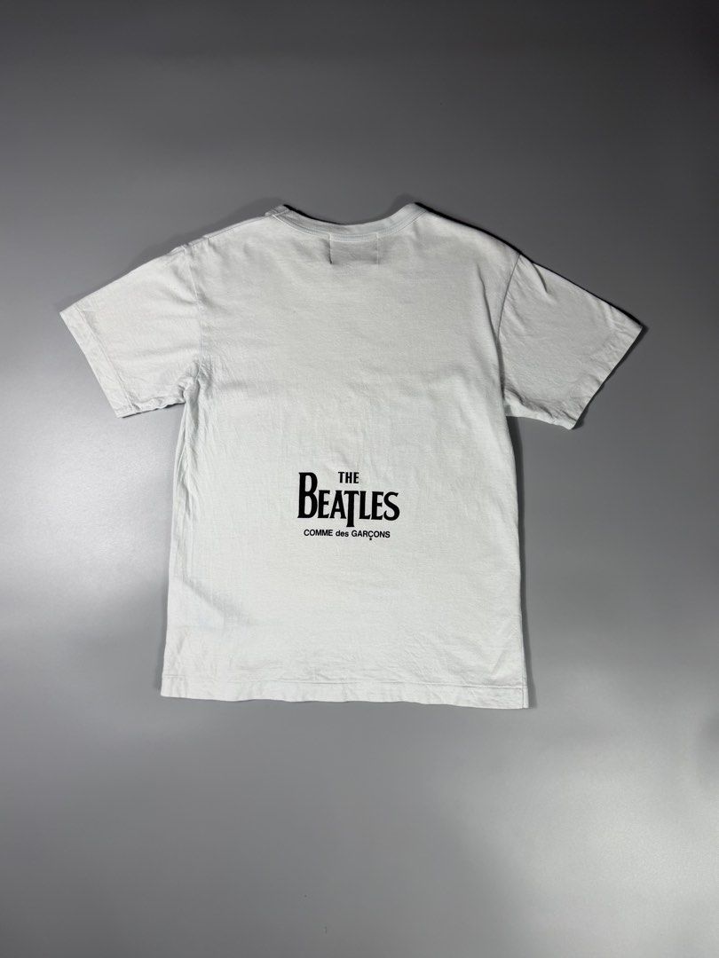 Comme Des Garcons x The Beatles Apple Tee (Category: Tshirts & Polo Shirts ) located in Manila. Submitted by whowearsstreetwear (Listing ID 1469923191, Image 2). Description: Comme Des Garcons x The Beatles Apple Tee (Authentic) - Size: Medium on tag (measurements in inches) W - 19 L - 26 Condition: Excellent Flaw/s: none + shipping fee Location: Manila (Near UST).