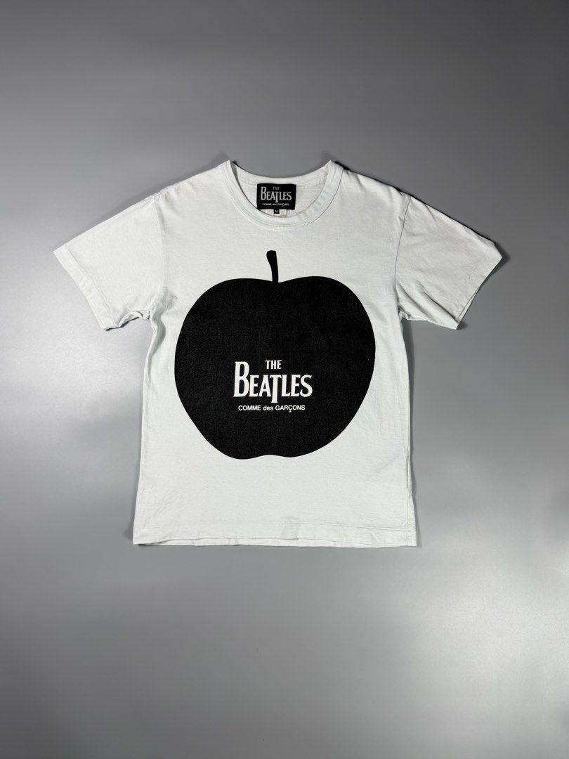 Comme Des Garcons x The Beatles Apple Tee (Category: Tshirts & Polo Shirts ) located in Manila. Submitted by whowearsstreetwear (Listing ID 1469923191, Image 1). Description: Comme Des Garcons x The Beatles Apple Tee (Authentic) - Size: Medium on tag (measurements in inches) W - 19 L - 26 Condition: Excellent Flaw/s: none + shipping fee Location: Manila (Near UST).