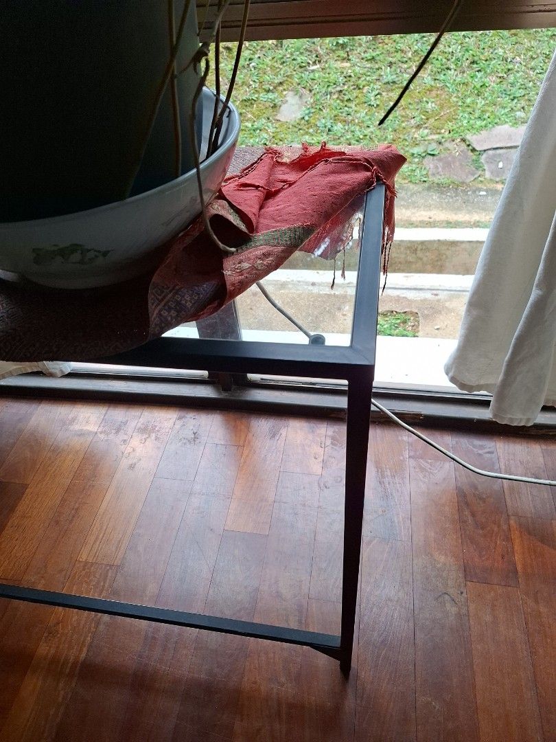 Console table (Category: Tables & Sets) located in Singapore. Submitted by tengreen (Listing ID 1469823068, Image 2). Description: - Sleek console table with black metal frame - Dimensions: 10 x 34 cm, Height 74 cm - Great for entryways, hallways, or displaying plants - Collect from Chestnut Ville .