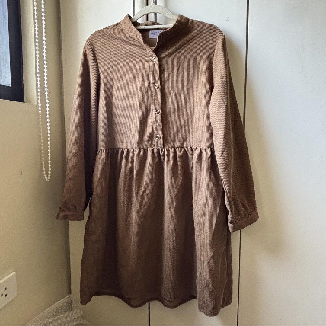 brown dress (Category: Dresses) located in Manila. Submitted by lavieelle (Listing ID 1469801794, Image 1). Description: - bought in states, high quality fabric - brown corduroy long sleeve dress with a stand collar and a gathered drop waist - best fit small to medium frames - rfs: decluttering .
