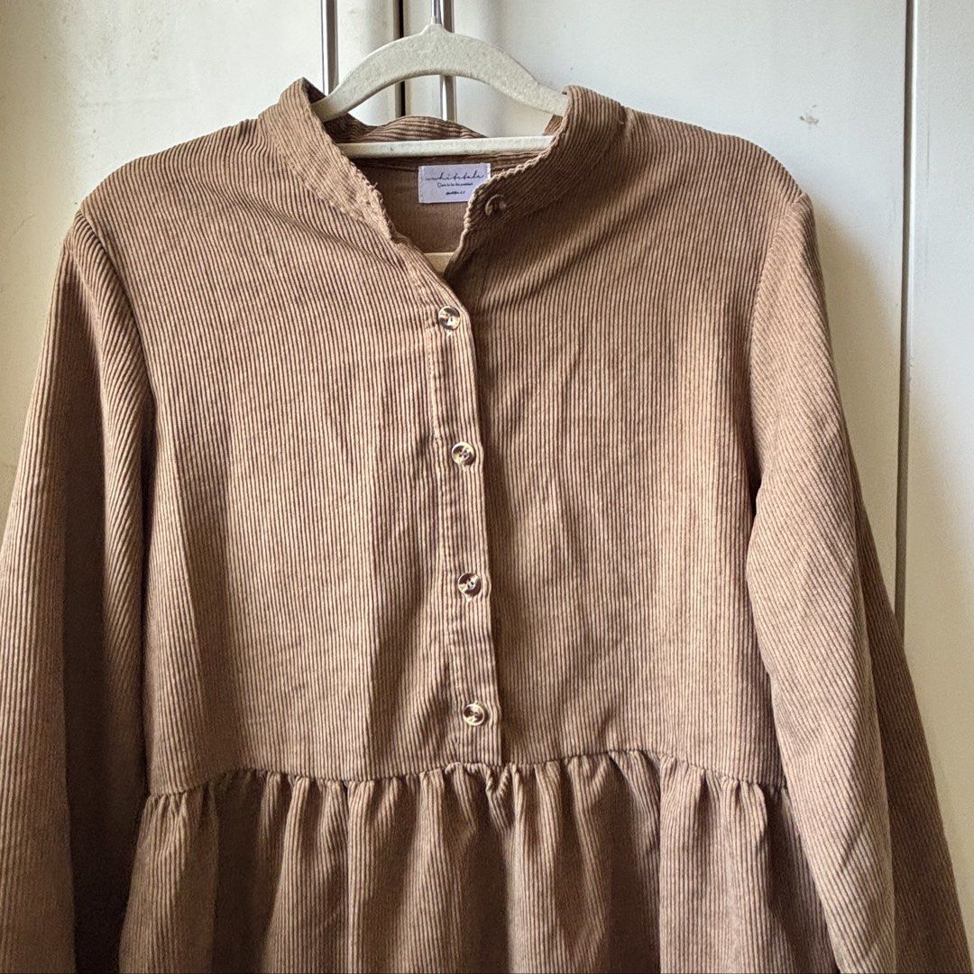 brown dress (Category: Dresses) located in Manila. Submitted by lavieelle (Listing ID 1469801794, Image 2). Description: - bought in states, high quality fabric - brown corduroy long sleeve dress with a stand collar and a gathered drop waist - best fit small to medium frames - rfs: decluttering .