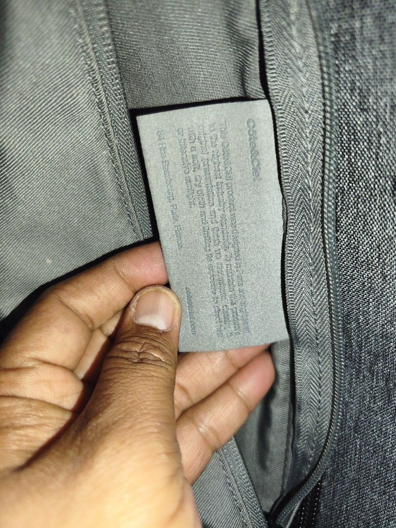 Cote&Ciel Grey Isar Backpack (Category: Backpacks) located in Bulacan. Submitted by THA_D_THRIFT (Listing ID 1469856097, Image 3). Description: - Brand: Cote&Ciel - Color: Sleek Grey - Design: Unique architectural shape with heavy-duty construction - Comfort: Padded back panel and adjustable straps - Storage: Deep side pockets with vertical zips, ideal for laptops and daily gear - Authenticity: Includes interior branded fabric tag and Paris addre