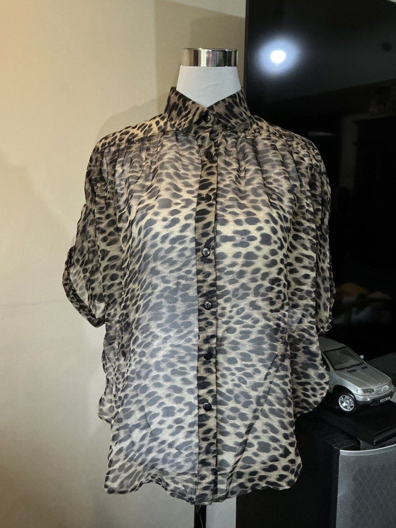 Cotton On Leopard Print Chiffon Blouse | Small (Category: Blouses) located in Quezon City. Submitted by shopabilitymnl (Listing ID 1469855771, Image 1). Description: Size: Small Issue: Faded color Mannequins’s Size: - Bust: 36-37 inches - Length: 23 inches.