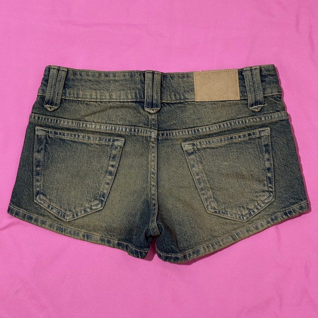 Cotton On Micro Low Denim Shorts (Category: Shorts) located in Quezon City. Submitted by luna_ily (Listing ID 1469927271, Image 2). Description: - Brand: Cotton On - Style: Micro low denim shorts with raw hems - Color: Washed blue - Size: 24 - Details: Classic five-pocket design, belt loops, button fly, and back leather patch - Condition: Excellent, versatile for warm weather 🍒 Send a message for more pictures (such as when worn) and inquiries. 