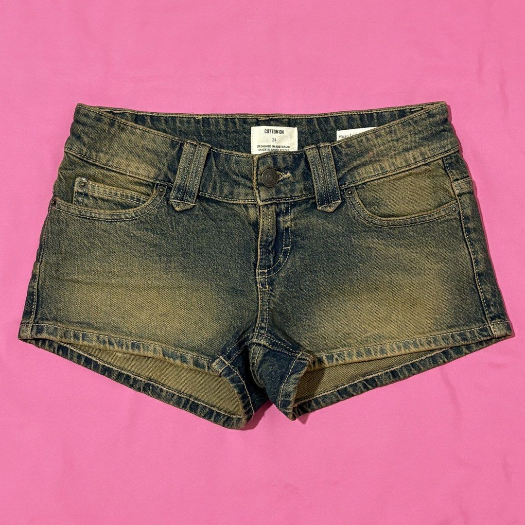 Cotton On Micro Low Denim Shorts (Category: Shorts) located in Quezon City. Submitted by luna_ily (Listing ID 1469927271, Image 3). Description: - Brand: Cotton On - Style: Micro low denim shorts with raw hems - Color: Washed blue - Size: 24 - Details: Classic five-pocket design, belt loops, button fly, and back leather patch - Condition: Excellent, versatile for warm weather 🍒 Send a message for more pictures (such as when worn) and inquiries. 