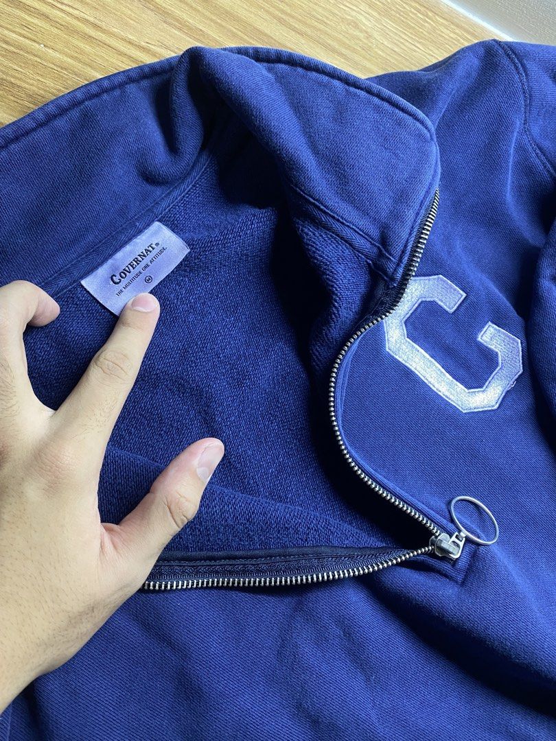Covernat Quarter Zip Navy Sweatshirt Size M (Category: Coats, Jackets and Outerwear) located in Manila. Submitted by brent.0765 (Listing ID 1469817481, Image 3). Description: - Brand: Covernat - Style: Quarter zip sweatshirt - Color: Navy blue - Size: Medium - Details: Large embroidered C patch on chest, small C logo on left wrist cuff, ring pull front zipper - Interior: Thick fleece-like lining for extra warmth and coziness - Condition: Excellen