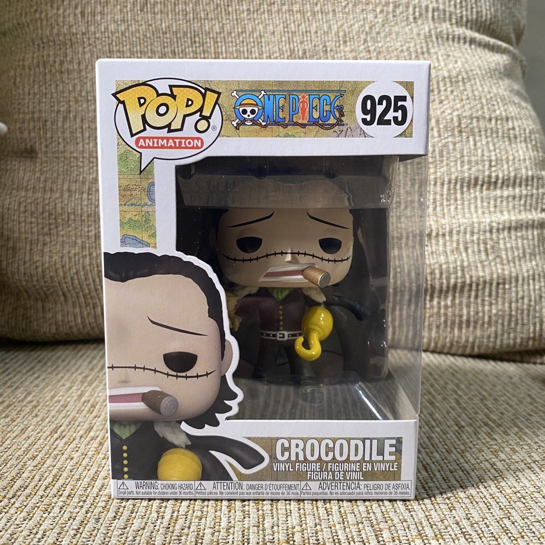 Crocodile Funko Pop (Category: Figurines & Statues) located in Paranaque City. Submitted by ddaveduave01162 (Listing ID 1469901529, Image 1). Description: - Character: Crocodile (#925) from One Piece - Features: Signature cigar and golden hook hand - Packaging: Original window box with vivid character artwork - Condition: Brand new / Great for anime and manga collectors - Trusted Carousell Seller: Fast shipping and secure packaging guaranteed! 9-