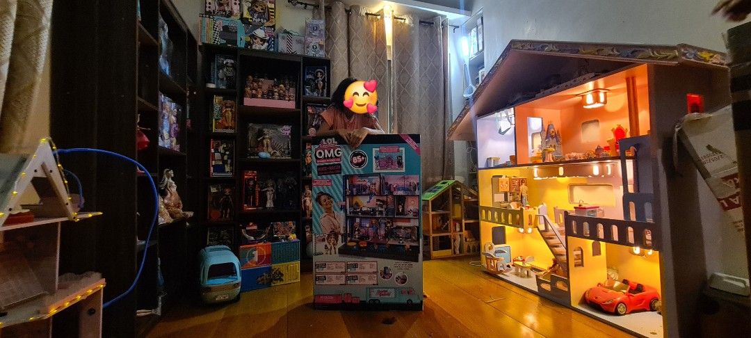 Customized Solid wood multi-story dollhouse with lights and furnitures (Category: Kids Toys) located in Binan City. Submitted by lesly.ly (Listing ID 1469908071, Image 3). Description: - Multi-story wooden dollhouse with sturdy construction and colorful painted details - Features working lights in the rooms, balconies, stairs, and a built-in closet on the top floor - Perfect gift for birthdays and special occasions *Note: This is really heavy and