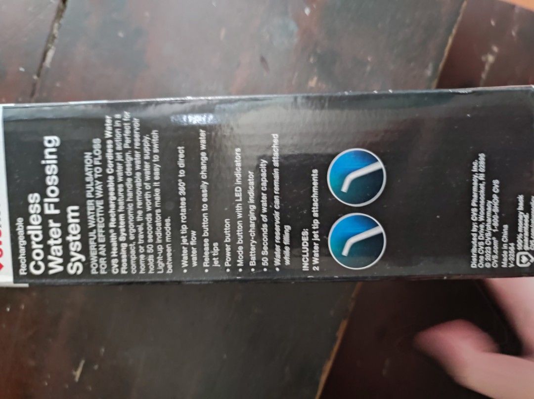 CVS Health Cordless Water Flossing System (Category: Oral Care) located in Quezon City. Submitted by valdimn (Listing ID 1469798739, Image 2). Description: - Brand: CVS Health - Type: Rechargeable cordless water flossing system - Modes: 3 settings (Normal, Soft, Pulse) - Capacity: 50 seconds of water capacity - Compatibility: Safe for braces, implants, and bridges - Benefits: Powerful water pulsation for effective flossing and improved gum health