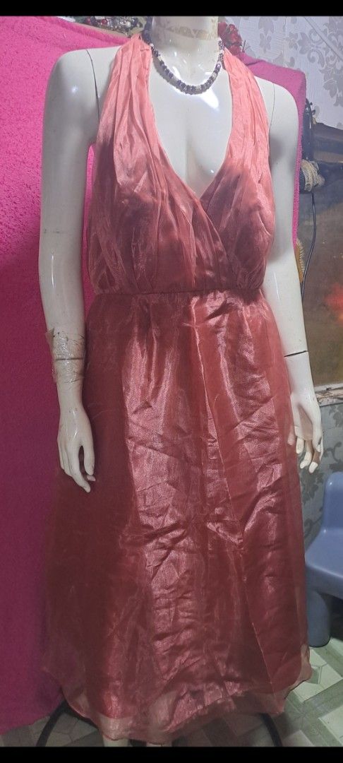 Danese Creations Phoenix AZ Orange Halter Dress (Category: Dresses) located in Davao. Submitted by bravemoon_556cd5 (Listing ID 1469801018, Image 1). Description: - Style: Orange shiny halter neck midi dress - Design: Deep V-neckline, fitted waist, and a large statement bow at the back - Brand: Danese Creations (Phoenix, AZ) - Occasion: Perfect for parties, weddings, and formal evenings - Fit: Easy to slip on, very comfortable to wear.