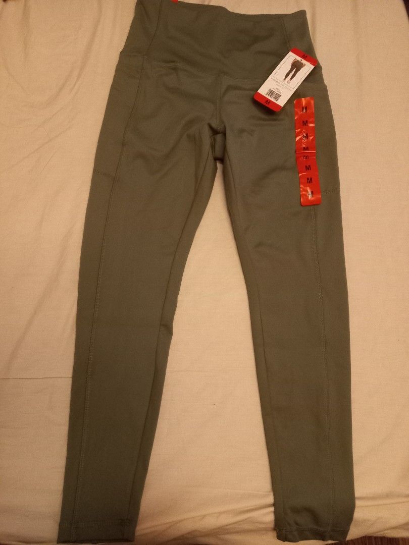 Danskin Activewear leggings (Category: Activewear) located in Makati City. Submitted by splintercell (Listing ID 1469812870, Image 3). Description: - Condition: Brand new with tags (BNWT) - Size: Medium (M) - Color: Green - Fit: High-rise with flattering front seam details - Features: Practical side pockets for phone and essentials - Material: Stretchy, comfortable fabric - Best for: Gym workouts, running errands, or everyday lounging.