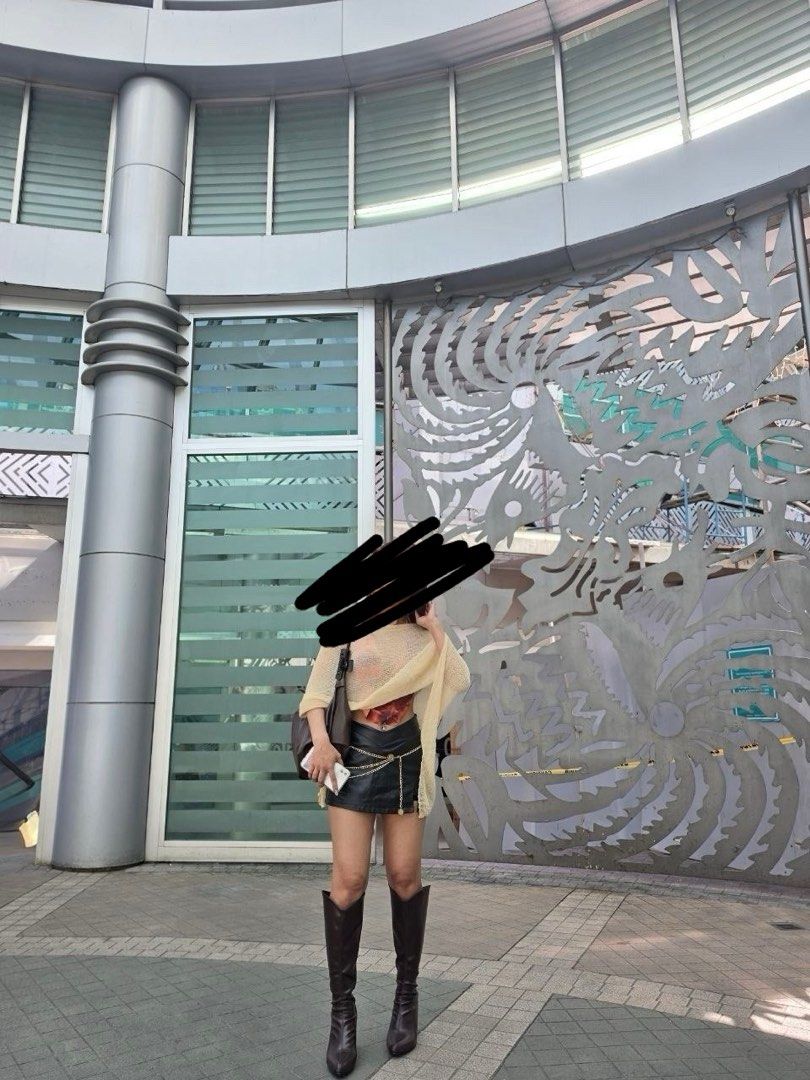 Dark brown knee-high leather boots (Category: Boots) located in Bacoor. Submitted by zzallys (Listing ID 1469862675, Image 2). Description: - Color: Dark brown - Style: Knee-high boots with pull-on design - Toe: Pointed - Heel: Block heel for everyday wear - Finish: Smooth leather - Season: Ideal for autumn and winter outfits.