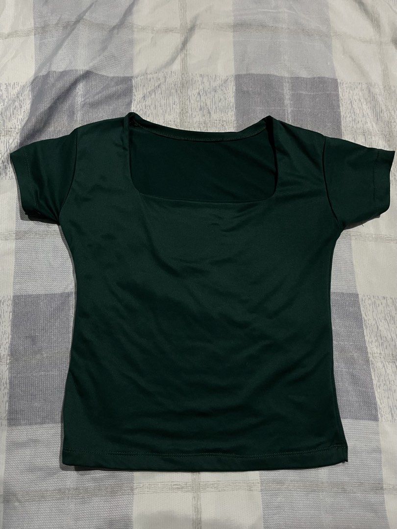 Dark green square neck short sleeve top (Category: Shirts) located in Legazpi City. Submitted by chynnunez (Listing ID 1469878100, Image 1). Description: - Color: Dark green - Neckline: Square neck - Sleeves: Short sleeves - Fit: Fitted silhouette - Material: Smooth, super soft stretch fabric - Styling: Perfect basic piece to pair with jeans or skirts.