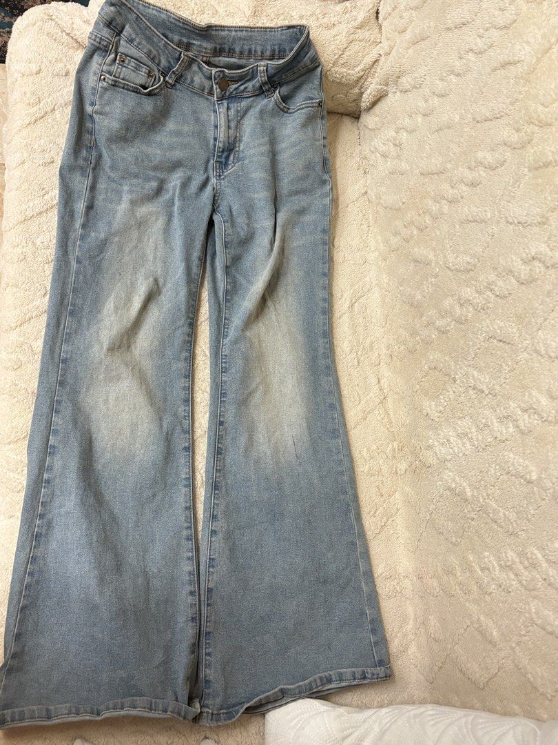 Dazy Light Wash Flare Jeans Size XS (Category: Jeans) located in Quezon City. Submitted by lovedbysloane (Listing ID 1469828596, Image 3). Description: - Brand: Dazy - Size: XS - Style: Flare jeans with mid-rise waist and button closure - Wash: Light wash blue with a stylish vintage faded look on the thighs - Material: Cotton blend, lightweight and breathable - Fit: Super comfortable, great for everyday casual wear.