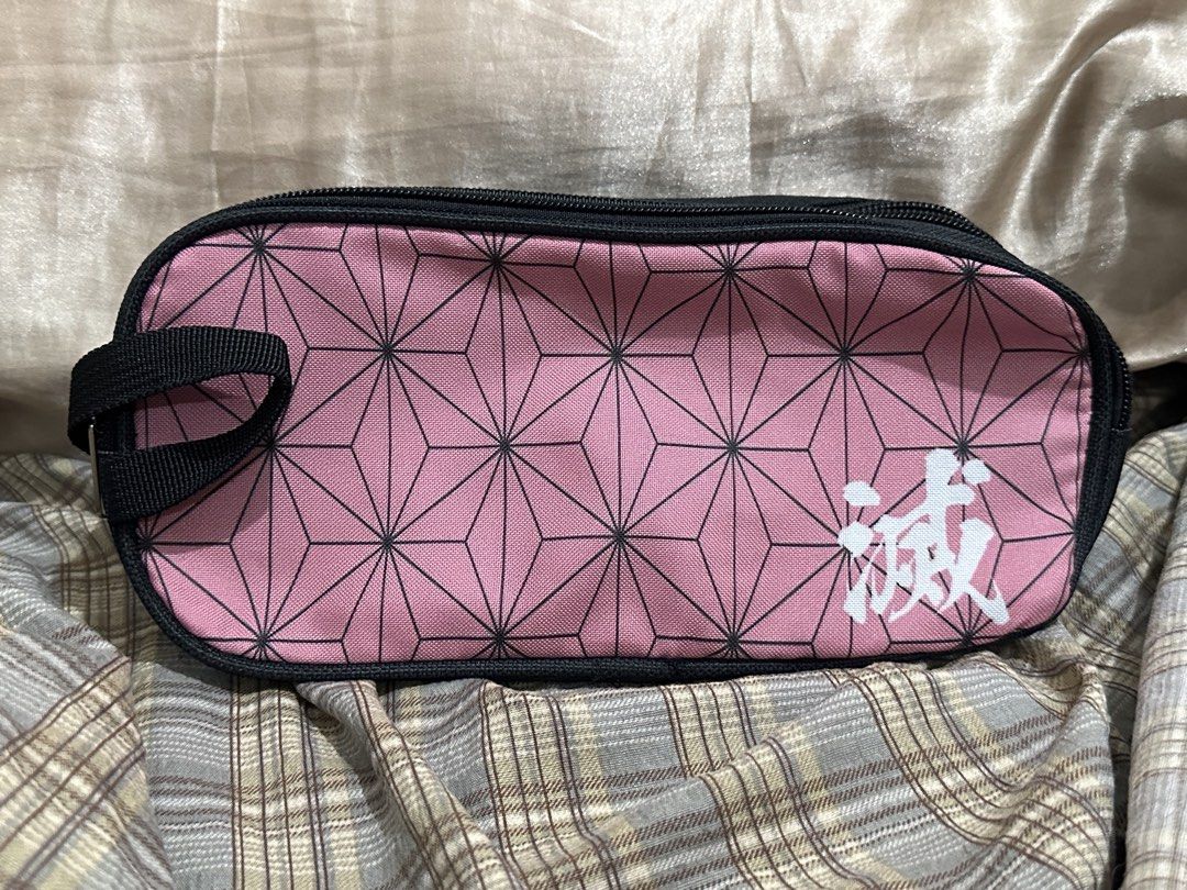 Demon Slayer Nezuko pencil case (Category: Purses & Pouches) located in Binan City. Submitted by laleynie (Listing ID 1469933028, Image 1). Description: ‼️⬇️⬇️⬇️!!PLEASE READ PO!!⬇️⬇️⬇️‼️ FIXED PRICE (no to nambabarat ng price please) Demon Slayer Nezuko Kamado Canvas Pencil Case Has minor flaw Do not hesitate to message for further condition. PAYO~ once paid, I will have it picked up same day before 5 o’clock or next day in the morning. MoP: GCA