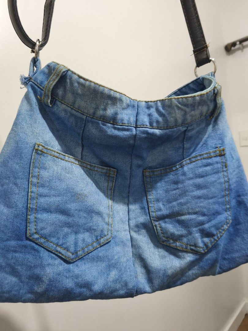 Denim bag Shoulder Bag Aesthetic (Category: Cross-body Bags) located in Taguig. Submitted by deyerreC2020 (Listing ID 1469883488, Image 3). Description: 80% cotton denim sling bag made from jeans in a classic blue wash with yellow contrast stitching. Features a secure top zipper, included na black faux leather strap with metal hardware, functional front snap pockets, back jeans pockets. Measures 14" x 11" x 1.8". Eco-friendly and stylish! trendy 
