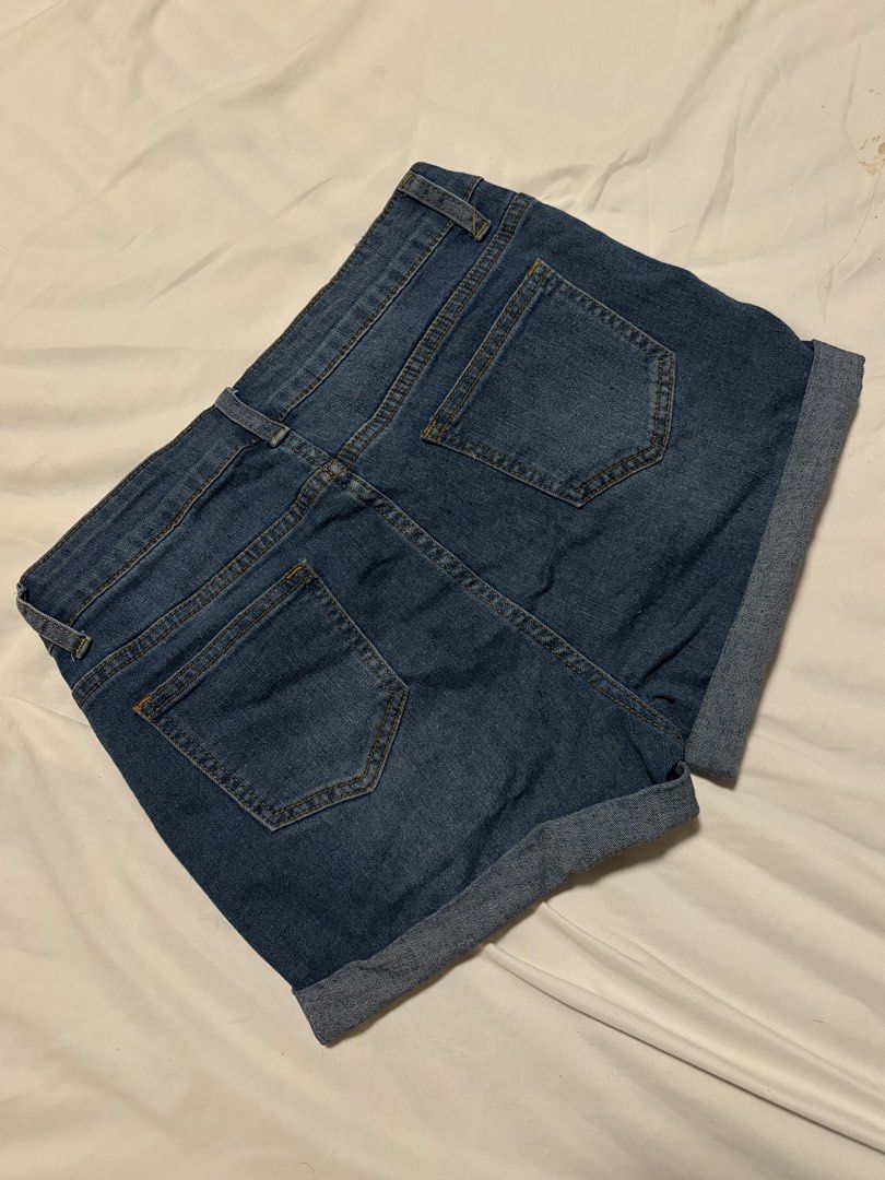 DENIM DISTRESSED SHORTS (Category: Shorts) located in Manila. Submitted by rellasoli (Listing ID 1469879400, Image 3). Description: *medium blue denim wash * High-waisted, flattering fit * Subtle distressed details on the front * Front and back pockets with belt loops * Condition: Preloved PLEASE READ🪽: * Please manage expectations as this is a preloved item. * Minor signs of wear may be present. * Color may slightly vary due to lighting. * No r