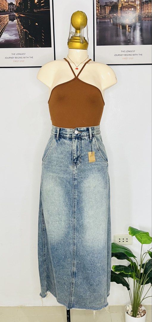 Denim Long Skirt | S: 26-27 (Category: Skirts) located in Manila. Submitted by bengirlclothing (Listing ID 1469773689, Image 2). Description: - Style: Light blue wash denim maxi skirt -Size: 26-27 inches -Length: 36 inches - Styling Tip: Looks amazing paired with a brown halter top.