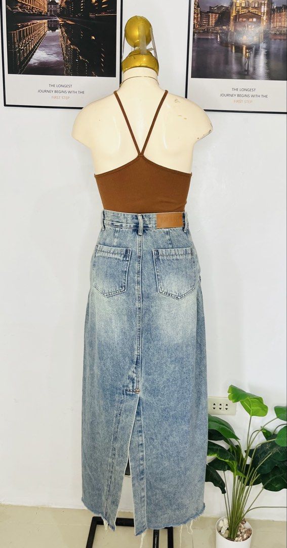 Denim Long Skirt | S: 26-27 (Category: Skirts) located in Manila. Submitted by bengirlclothing (Listing ID 1469773689, Image 3). Description: - Style: Light blue wash denim maxi skirt -Size: 26-27 inches -Length: 36 inches - Styling Tip: Looks amazing paired with a brown halter top.