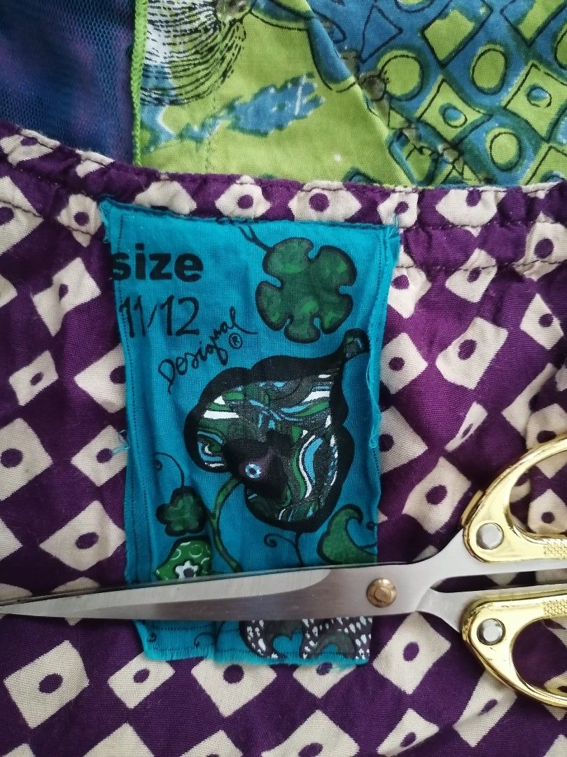 Desigual Multicolor print Mini Dress Size (Category: Dresses) located in Davao. Submitted by blueberrycheesecake_03 (Listing ID 1469798028, Image 3). Description: - Brand: Desigual Kids - Size: 11/12 (can fit xs adult) - Condition: good condition - flaw: may butas sa gilid ng layered na mesh (see last slide) .