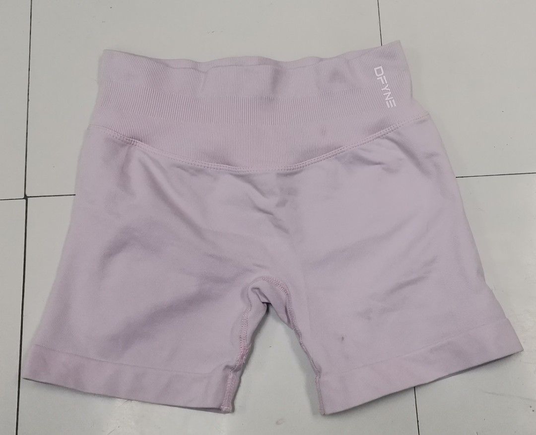 DFYNE Seamless Gym Shorts (Category: Activewear) located in Cavite. Submitted by nehlfab08 (Listing ID 1469863571, Image 1). Description: - Brand: DFYNE - Design: High ribbed waistband with branding, back ruching, and 'LET NOBODY DFYNE YOU' inner quote - Fabric: Stretchy, seamless knit - Condition: Good condition needs wash only - Ideal for: Gym workouts and daily activewear.