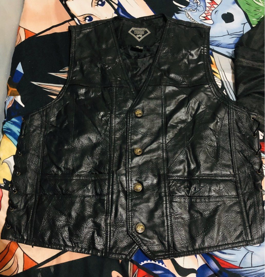 Diamond Plate Genuine Leather Biker Vest (Category: Vests) located in Manila. Submitted by gobvs222 (Listing ID 1469927000, Image 3). Description: - Brand: Diamond Plate - Material: Genuine black leather - Design: Large embroidered 'Live to Ride' eagle and American flag back patch - Hardware: Heavy-duty metal snap buttons with buffalo details - Fit: Adjustable lace-up sides for a custom fit - Storage: Multiple front pockets - Style: Classic heavy
