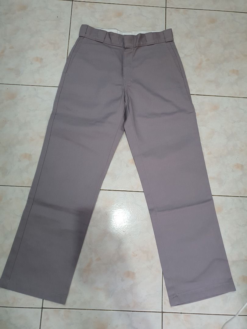 Dickies Grey Work Pants (Category: Trousers) located in Caloocan City. Submitted by cleverwind_1e53ab (Listing ID 1469804957, Image 3). Description: - Brand/Item: Grey Dickies work pants - Fit/Style: Classic straight leg with standard belt loops - Material: Sturdy twill fabric, great for everyday wear - Closure: Front button and zipper fly - Features: Convenient back pockets - Condition: Clean condition all around -size W30 L32.