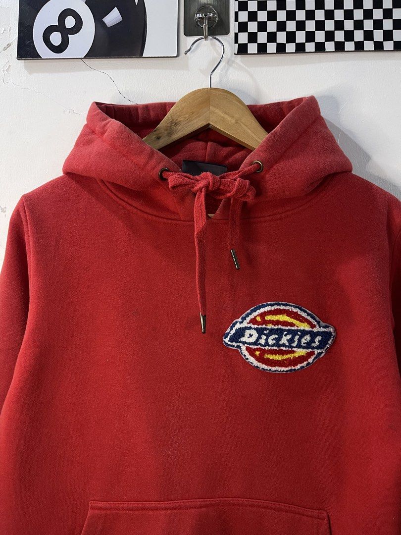 Dickies Since 1922 Red Hoodie Medium (Category: Hoodies) located in Cabagan. Submitted by blessingma81004 (Listing ID 1469759236, Image 3). Description: - Brand: Dickies - Item: Hoodie - Color: Red (9/10 rating) - Size: Medium (Width: 20 inches, Length: 25 inches) - Material: 100% Cotton - Design: Large embroidered logo patch on chest with front kangaroo pocket - Condition: Small burnt hole located inside the hood (completely hidden from the outs