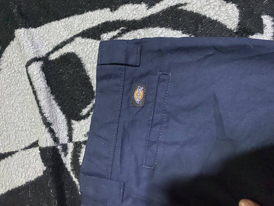 Dickies Slim Taper Pants Navy Blue Size 14 (Category: Trousers) located in Manila. Submitted by kentmarion.water (Listing ID 1469902021, Image 3). Description: - Brand: Dickies - Color: Navy blue - Size: 30 BY 39 - Fit: Standard through the leg with a tailored taper - Style: Classic workwear with belt loops and zip fly with button closure - Details: Back welt pockets and woven logo patch above the right pocket - Condition: Clean fabric with no no
