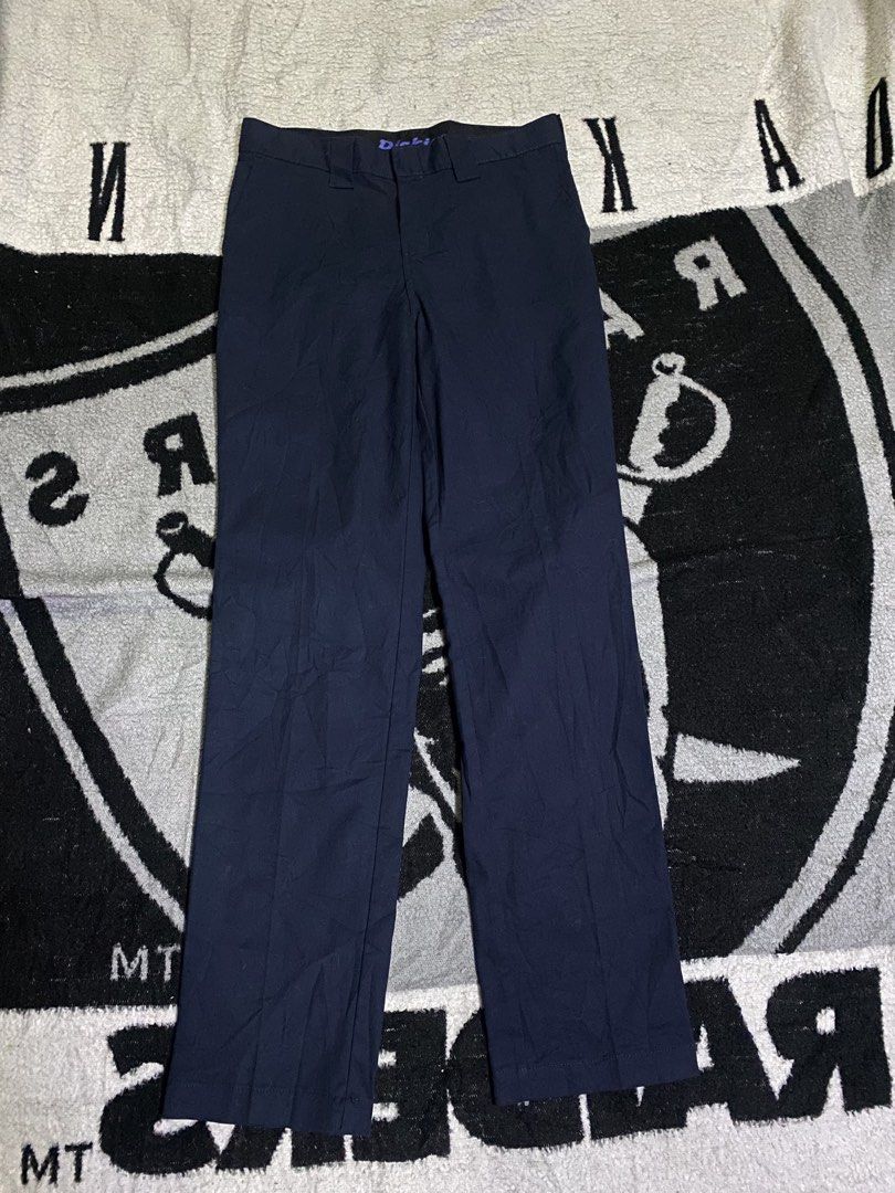 Dickies Slim Taper Pants Navy Blue Size 14 (Category: Trousers) located in Manila. Submitted by kentmarion.water (Listing ID 1469902021, Image 1). Description: - Brand: Dickies - Color: Navy blue - Size: 30 BY 39 - Fit: Standard through the leg with a tailored taper - Style: Classic workwear with belt loops and zip fly with button closure - Details: Back welt pockets and woven logo patch above the right pocket - Condition: Clean fabric with no no