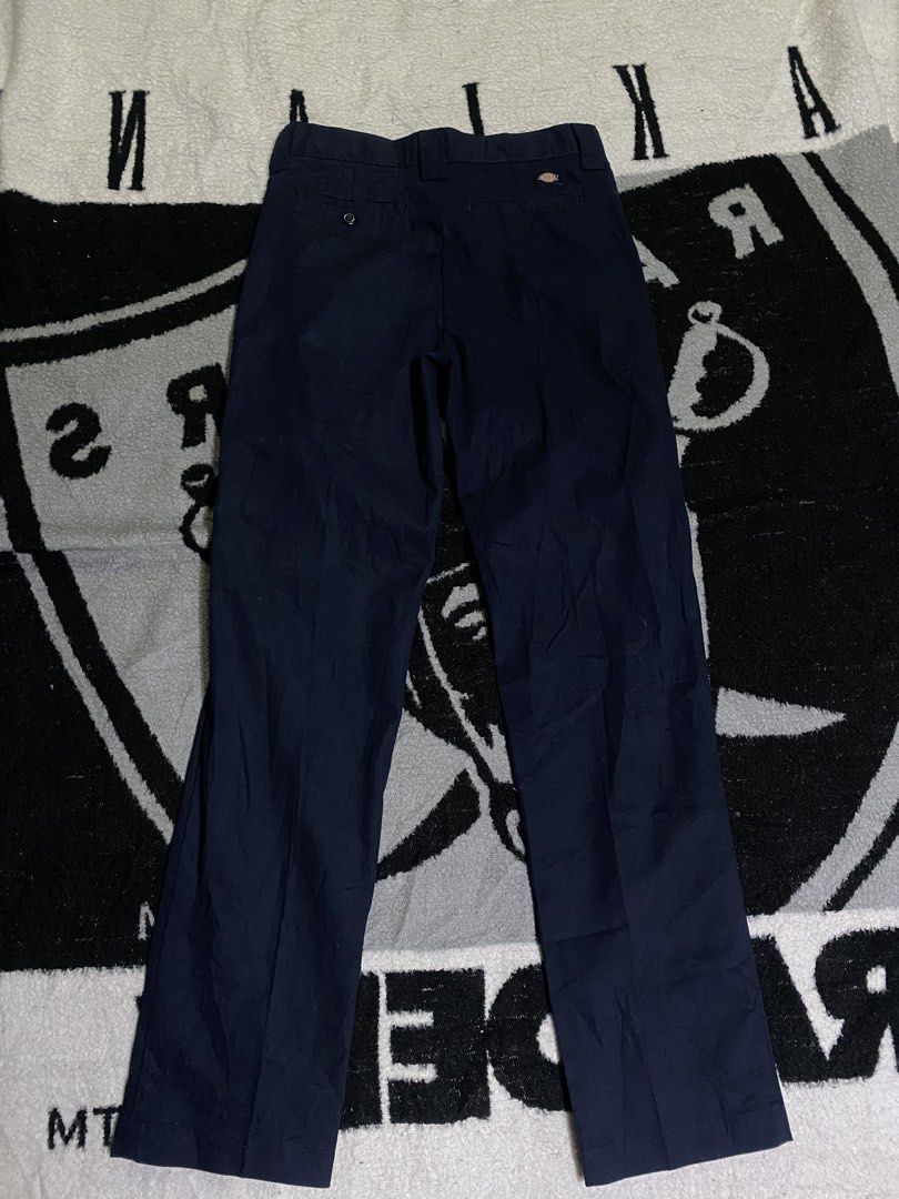 Dickies Slim Taper Pants Navy Blue Size 14 (Category: Trousers) located in Manila. Submitted by kentmarion.water (Listing ID 1469902021, Image 2). Description: - Brand: Dickies - Color: Navy blue - Size: 30 BY 39 - Fit: Standard through the leg with a tailored taper - Style: Classic workwear with belt loops and zip fly with button closure - Details: Back welt pockets and woven logo patch above the right pocket - Condition: Clean fabric with no no