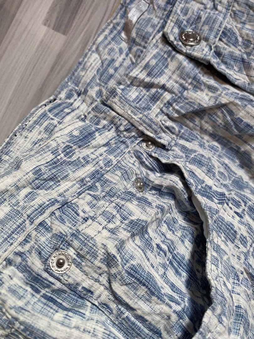 Dior Homme Blue Patterned Trousers Size 34 (Category: Luxury Apparel) located in Bayambang. Submitted by vintagestuffph (Listing ID 1469809367, Image 3). Description: - Brand: Dior Homme - Color/Pattern: Blue and white patterned fabric - Size: 34 - Fit: Regular straight fit - Closure: Button fly with branded metal hardware - Material: Cotton blend with leather label detail - Origin: Made in Italy - Condition: Clean, ready to wear.