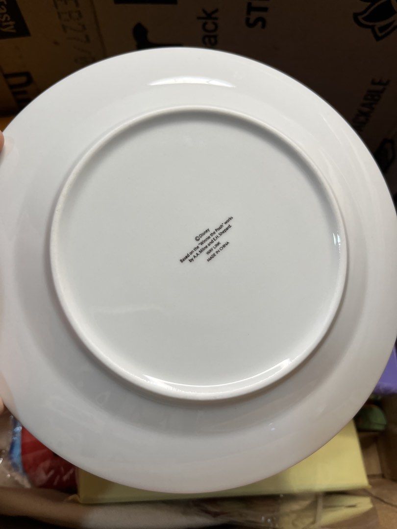 Disney Winnie the Pooh ceramic plate with box (Category: Dinnerware & Cutlery) located in Gapan. Submitted by lunashop14 (Listing ID 1469824496, Image 3). Description: - Official Disney merchandise: Winnie the Pooh & Piglet ceramic plate by Way Link - Design: Features Pooh and Piglet with lovely floral accents and butterflies - Size: Standard dessert/snack plate size - Packaging: Includes original purple Disney branded storage box - Condition: Br