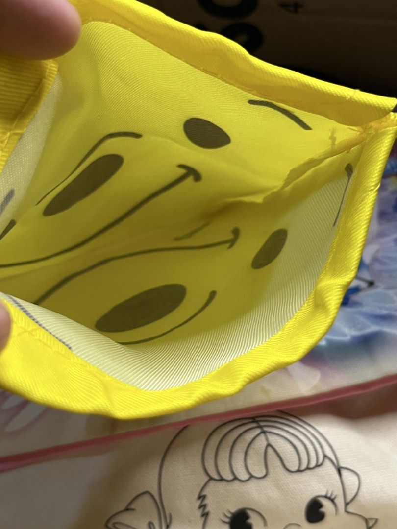 Disney Winnie the Pooh Yellow Drawstring Pouch (Category: Purses & Pouches) located in Gapan. Submitted by lunashop14 (Listing ID 1469836079, Image 2). Description: - Authentic Disney Winnie the Pooh merchandise - Vibrant yellow drawstring pouch with cute character graphics - Clean interior lining for safe storage - Handy size for organizing cosmetics, coins, or daily trinkets - Perfect for tossing into your everyday tote.