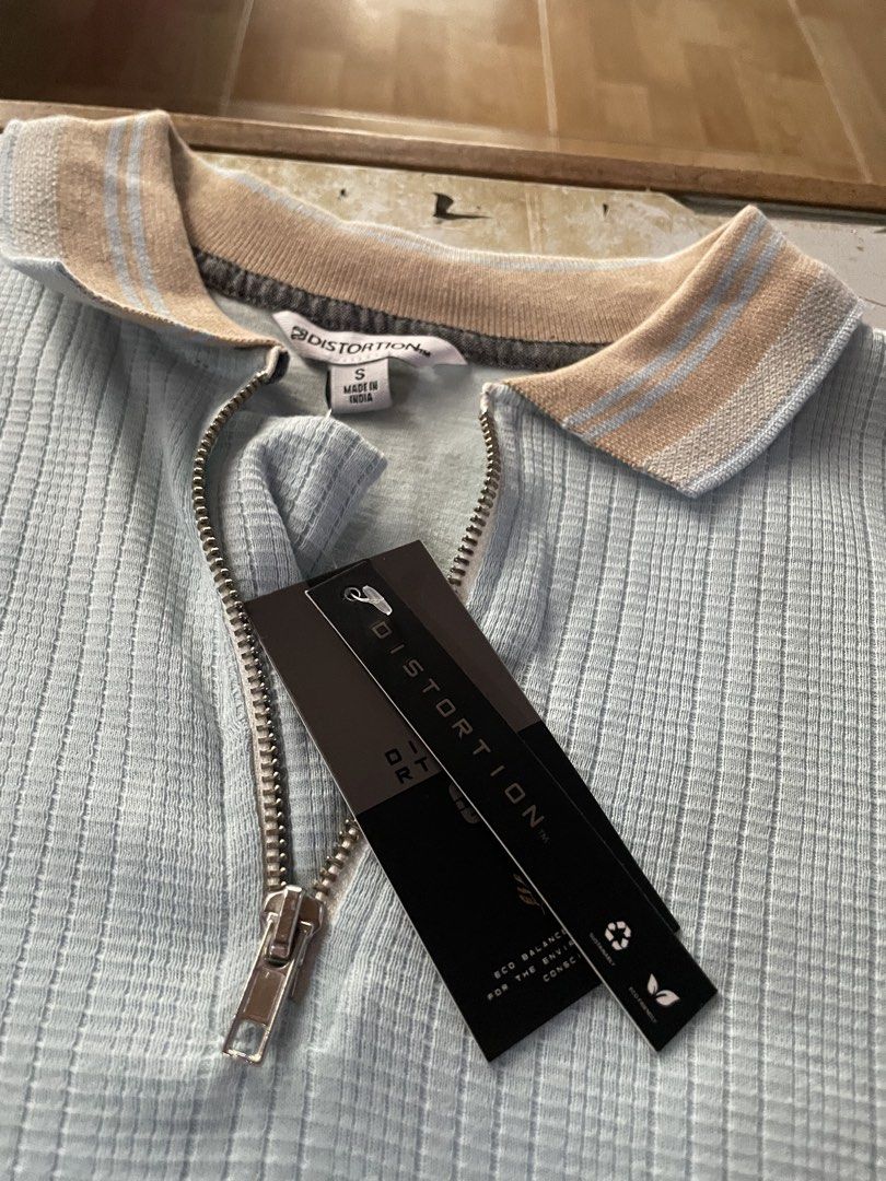 Distortion Blue Zip Polo (Category: Tshirts & Polo Shirts ) located in Malungon. Submitted by maxxyyy1 (Listing ID 1469829484, Image 2). Description: Polo Shirt Brand New Size Small .