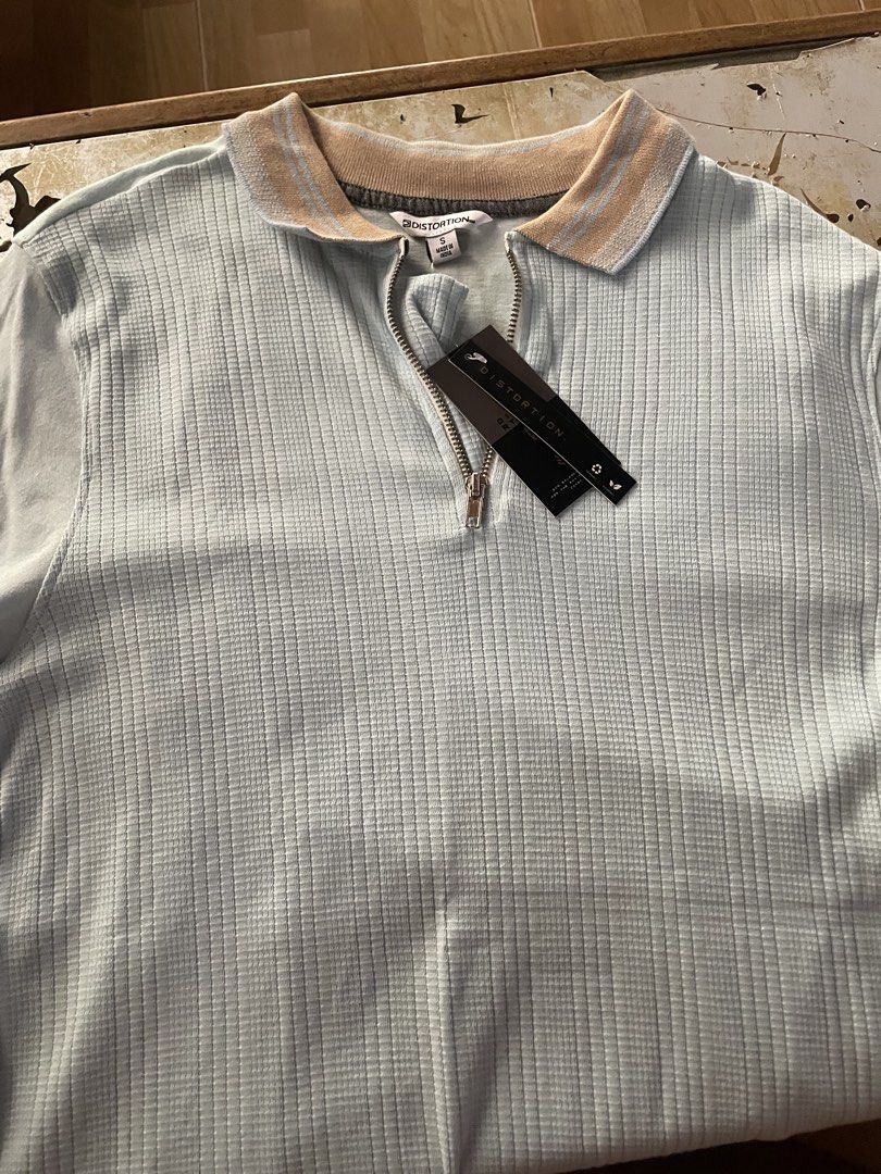 Distortion Blue Zip Polo (Category: Tshirts & Polo Shirts ) located in Malungon. Submitted by maxxyyy1 (Listing ID 1469829484, Image 1). Description: Polo Shirt Brand New Size Small .