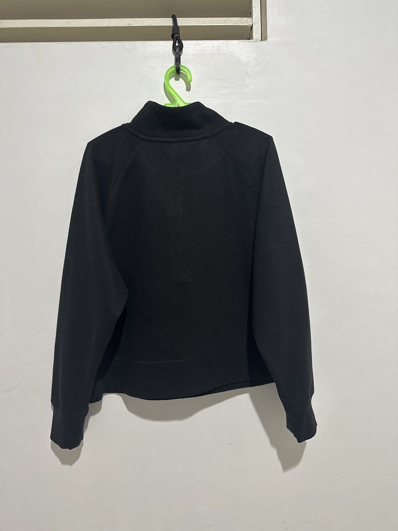 DKNY Sport Half-zip Black Sweatshirt (Category: Coats, Jackets and Outerwear) located in Cainta. Submitted by xyzasisa (Listing ID 1469908775, Image 3). Description: - Brand: DKNY Sport - Color: Black - Style: Quarter-zip pullover with mock neck and branded metal zipper pull - Details: Eye-catching rhinestone logo on chest, functional front kangaroo pocket, branded inner collar taping, ribbed cuffs and hem - Condition: Clean overall look - Best f