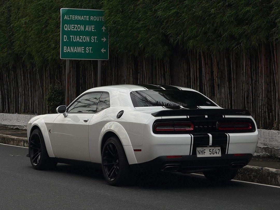 Dodge Challenger R/T Scat Pack Widebody Auto (Category: Used Cars) located in Manila. Submitted by quality_cars (Listing ID 1469922049, Image 3). Description: FOR SALE / FINANCING ❗️ 🇺🇸 2023 Dodge Challenger R/T Scat Pack Widebody ⭐ FEATURES • 6.4L / 392 HEMI V8 • 485 HP • 644 Nm Torque • 8-Speed Automatic Transmission • Widebody Fender Flares • Brembo Performance Brakes • Sport / Track Modes • Launch Control • Performance Suspension • Premium 