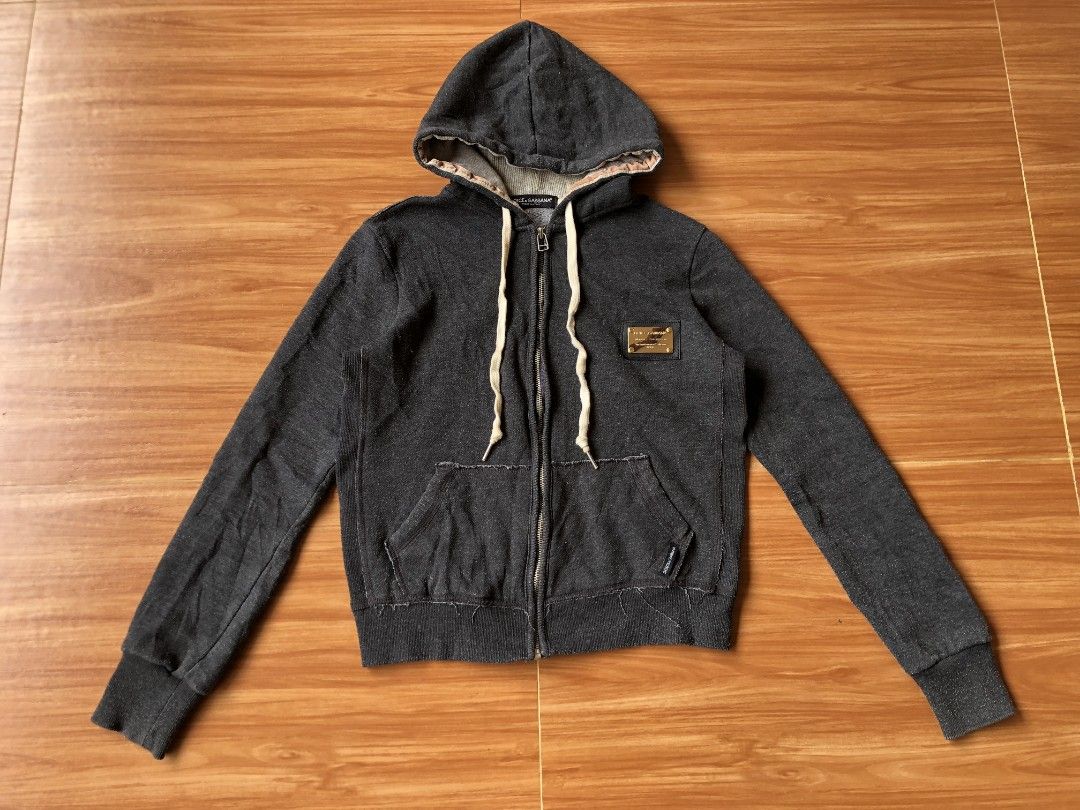 DOLCE AND GABBANA ZIP JACKET (Category: Coats, Jackets and Outerwear) located in Baybay. Submitted by dathrifted (Listing ID 1469800588, Image 1). Description: DOLCE AND GABBANA ZIP JACKET Width- 19.5 Length- 21 EXCELLENT CONDITION HONEST ISSUE: lints.