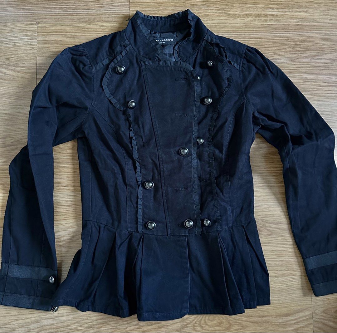 Dorothy Perkins Black Jacket (Category: Coats, Jackets and Outerwear) located in Mandaluyong City. Submitted by unworntobarelyworn (Listing ID 1469862878, Image 1). Description: - Brand: Dorothy Perkins - Size: UK 8 / Euro 36 - Color: Black - Style: Vintage-inspired military jacket with double-breasted dome buttons - Details: Ruffle trim along the placket, structured button-accent cuffs, and a flared peplum hem at the back - Fit: Stand-up collar 