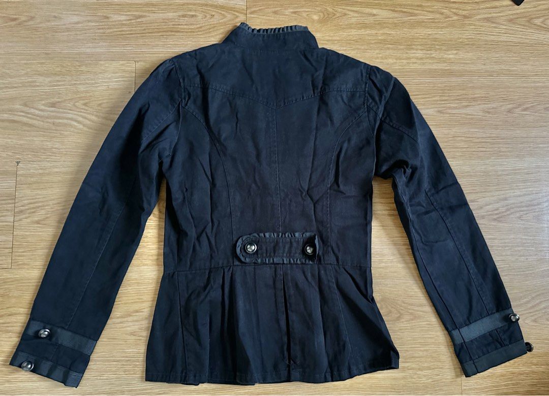 Dorothy Perkins Black Jacket (Category: Coats, Jackets and Outerwear) located in Mandaluyong City. Submitted by unworntobarelyworn (Listing ID 1469862878, Image 2). Description: - Brand: Dorothy Perkins - Size: UK 8 / Euro 36 - Color: Black - Style: Vintage-inspired military jacket with double-breasted dome buttons - Details: Ruffle trim along the placket, structured button-accent cuffs, and a flared peplum hem at the back - Fit: Stand-up collar 