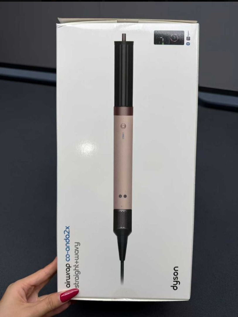 Dyson Airwrap co-anda2x straight+wavy (Category: Hair) located in Marikina City. Submitted by cosmicdolphin-781db1 (Listing ID 1469900211, Image 3). Description: - 100% Authentic Dyson Airwrap multi-styler in Pink & Rose Gold - Features a black textured grip section for better control during styling - Includes the Co-anda 2x attachment for both straight and wavy looks - Complete with original cardboard box and custom molded paper pulp tray - Exce